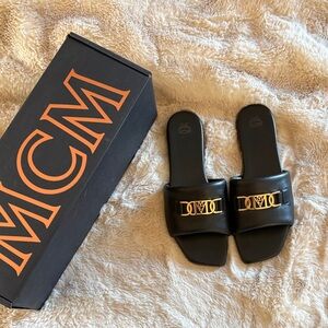 MCM Black Slides with Gold Detailing